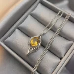 Golden Ember Wing Pendant - Image 4