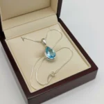 Blue Topaz Glow Teardrop Pendant - Image 3
