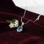 Blue Topaz Glow Teardrop Pendant - Image 2