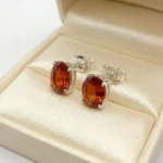 Amber Spark Stud Earrings - Image 2
